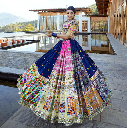 The only way to describe your navratri night classy is by wearing this Blue Color Lehenga With Real Mirror Work