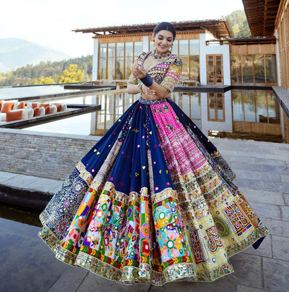The only way to describe your navratri night classy is by wearing this Blue Color Lehenga With Real Mirror Work